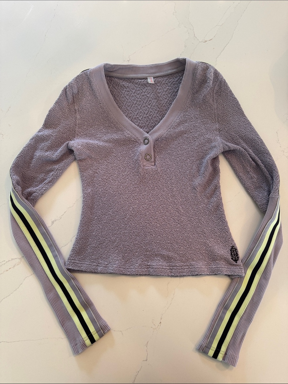 FP Movement Recovery Layer long sleeve top in purple with sporty sleeve stripes.